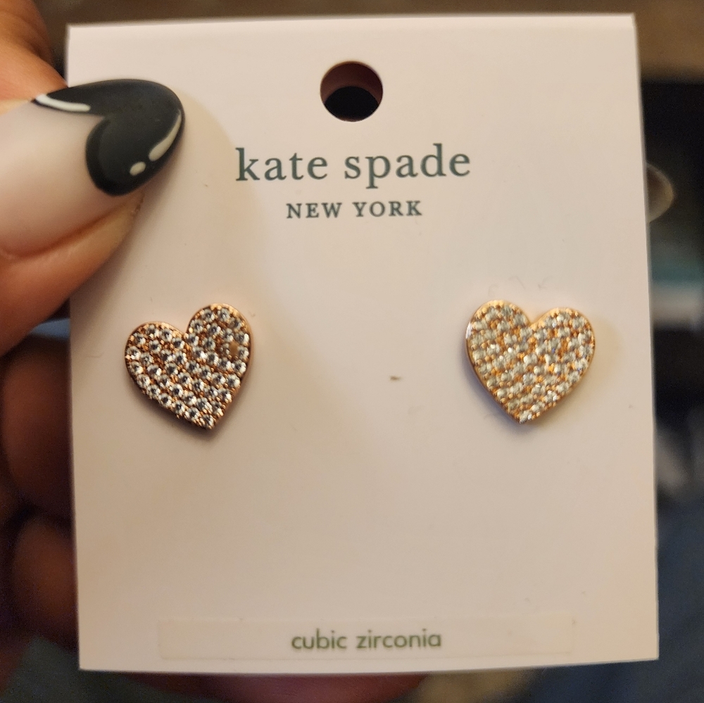 Kate Spade heart earnings